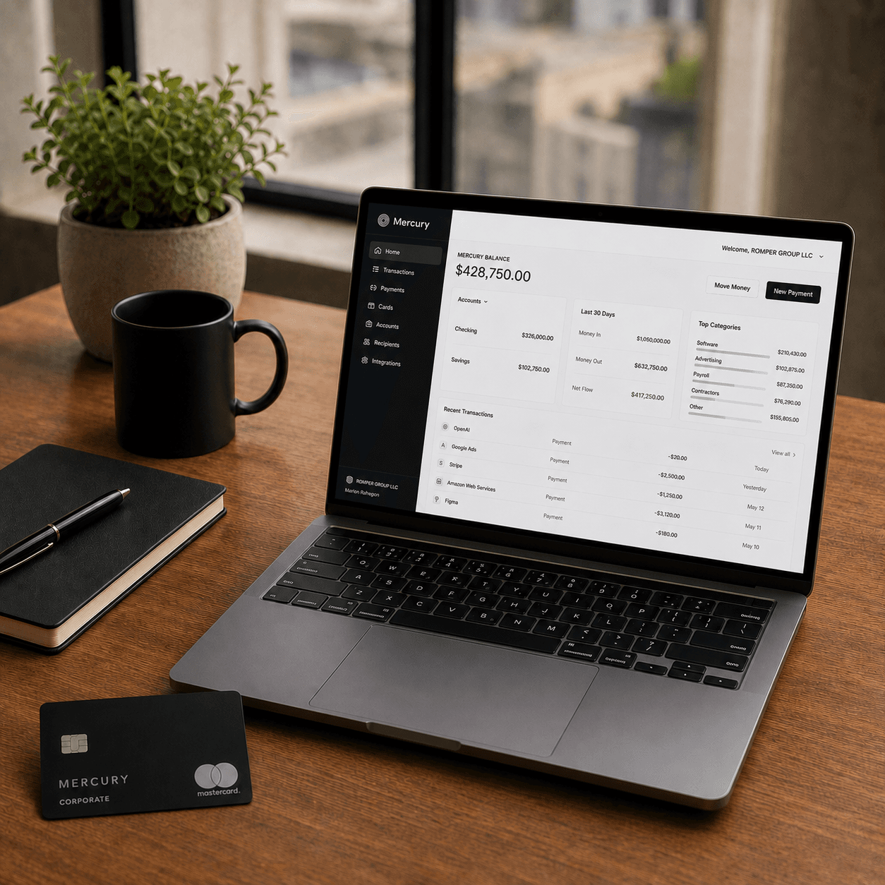 Notebook com o dashboard bancário americano aberto; cartão corporativo ao lado
